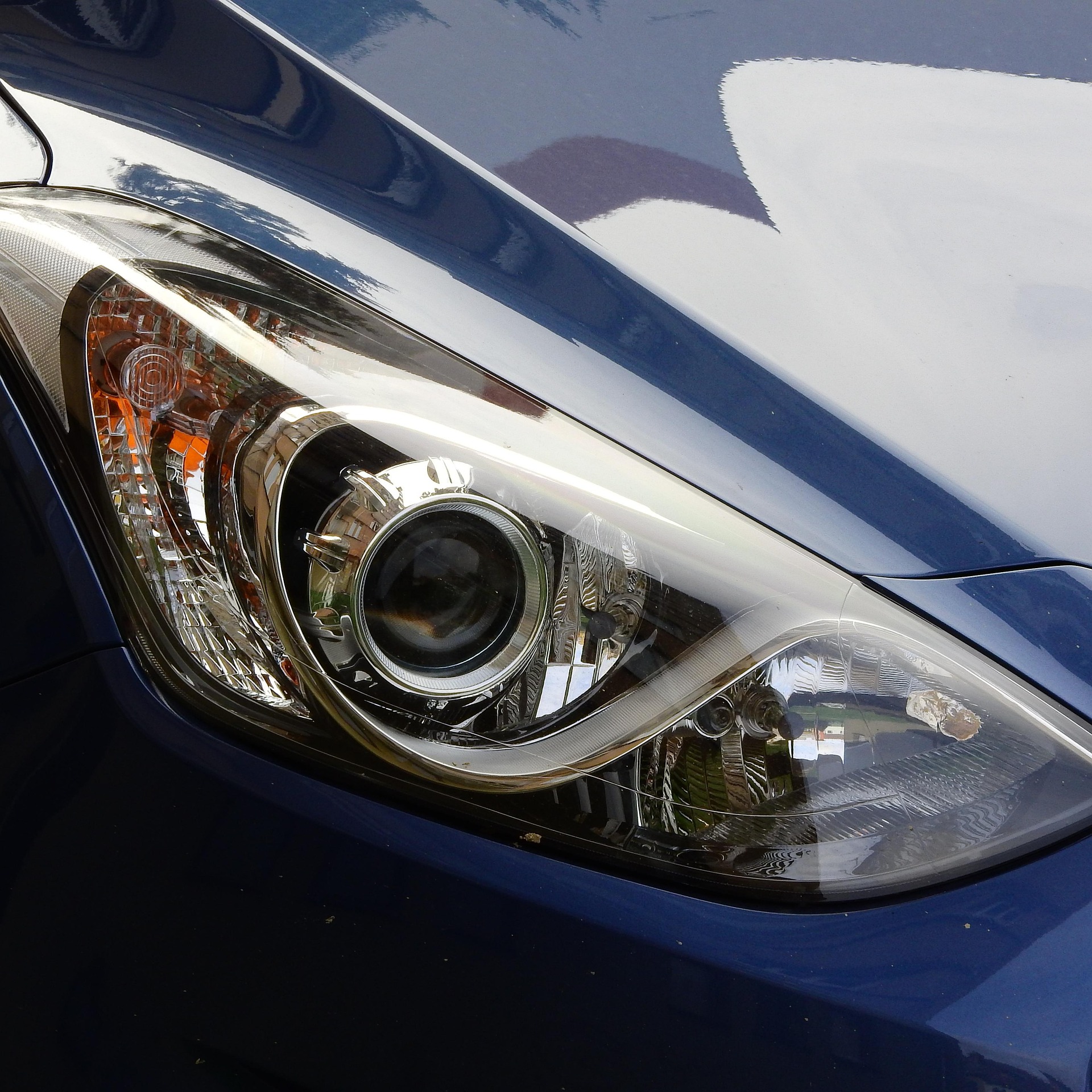 Clear restored headlight showing the result of professional headlight restoration