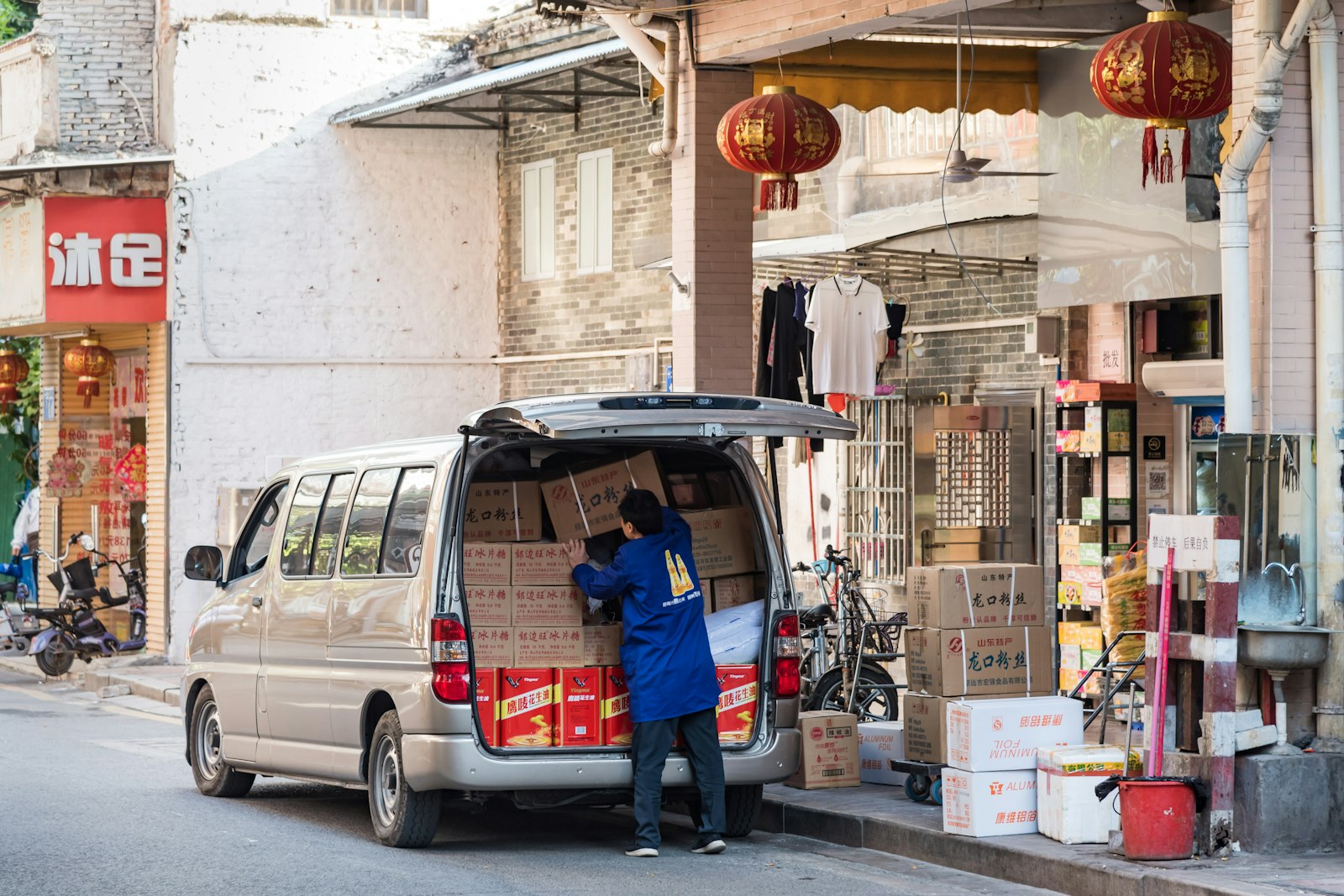 delivery driver beside a van representing package delivery work