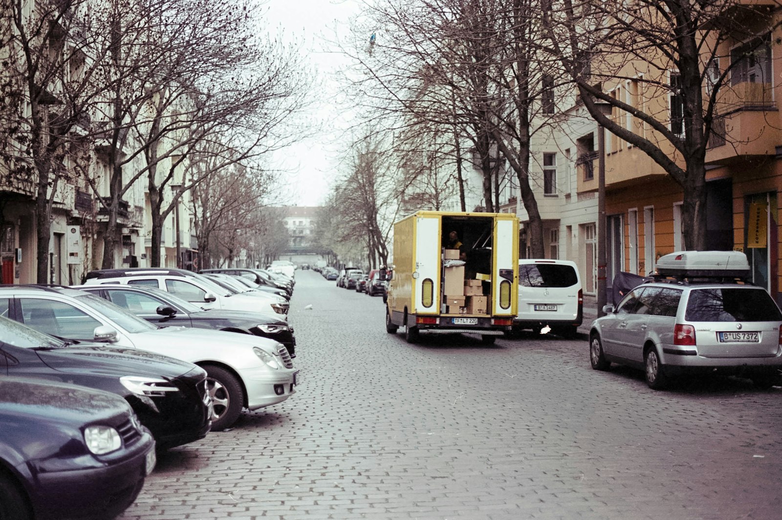 delivery vehicle on the road representing medical courier work